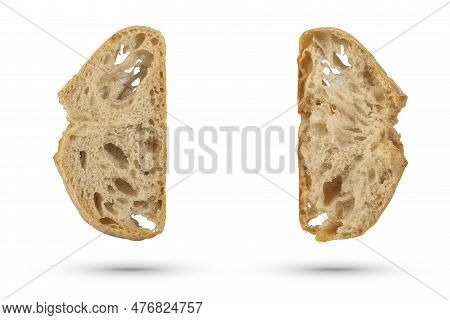 Two Slices Of Fresh Ciabatta Bread On A White Isolated Background. Slices Hang Or Fall On A White Ba