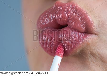 Lipstick. Make-up For Lips. Lipstick And Pomade. Close Up Red Lips. Pink Lipstick. Pomade. Applying 