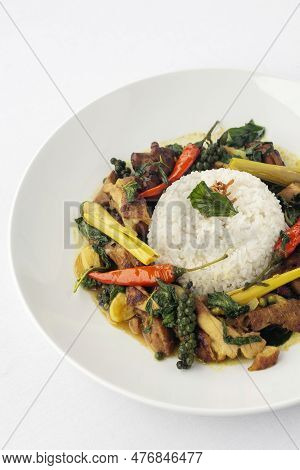 Pad Krapow Gai Spicy Thai Chicken Vegetable Stir Fry On White Plate