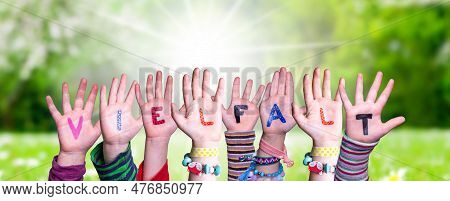 Children Hands Building Word Vielfalt Means Diversity, Grass Meadow
