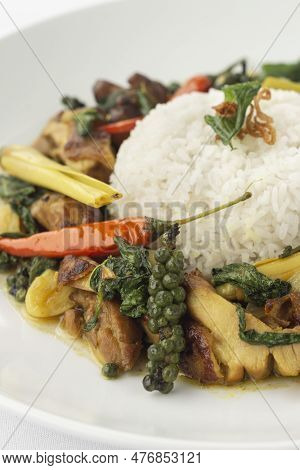 Pad Krapow Gai Spicy Thai Chicken Vegetable Stir Fry On White Plate
