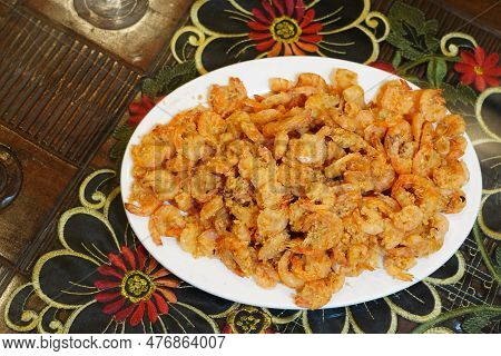 Crispy Fried Shrimps Served On White Plate For Lunch.