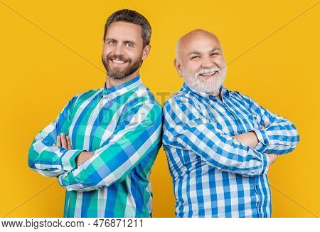 Image Of Two Generation Family Men Wear Checkered Shirt. Two Generation Family Men