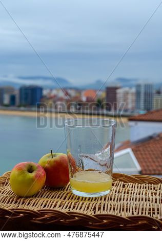 Traditional Natural Asturian Cider Made From fermented Apples In Wooden Barrels Should Be Poured Fro