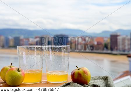 Traditional Natural Asturian Cider Made From fermented Apples In Wooden Barrels Should Be Poured Fro