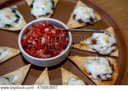 Cheese Nacho With Spinach And Meat, Served With Tomato Salsa Dip Sauce