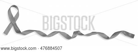 Closeup Of A Gray Curled Awareness Ribbon Isolated On A White Background With Clipping Path.