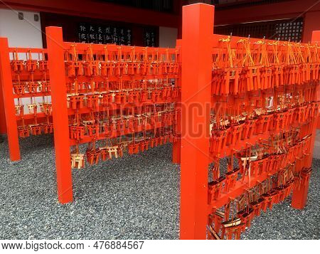Closeup Ema (wooden Prayer Tablets) In Red Torii At Fushimi Inari Shrine In Kyoto, Japan. Ema Are Sm