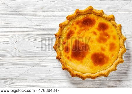 Classic Sugar Cream Pie, Hoosier Pie, Indiana Custard Cream Pie On White Baking Dish On White Wood T