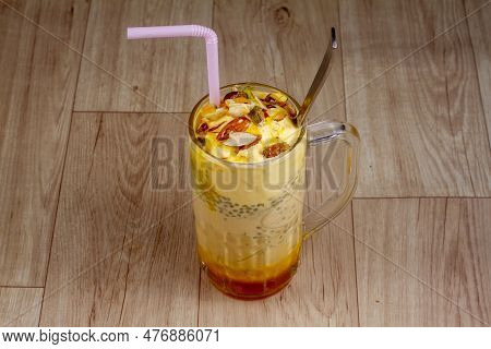 Chill Mango Falooda In Glass On Wooden Background