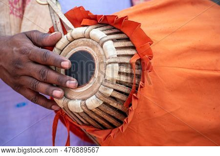 The Khol Is Being Played By A Devotee. This Is A Two-sided Terracotta Drum Used In Northern And East