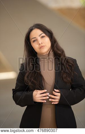 Young Attractive Woman Wearing Casual Clothing Posing Outdoors In The City. Nicosia Cyprus