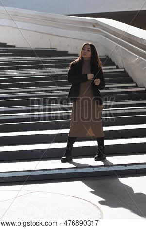 Young Attractive Woman Wearing Casual Clothing Posing Outdoors In The City. Nicosia Cyprus
