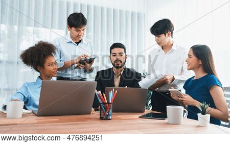 Happy Diverse Business People Work Together, Discussing In Corporate Office. Professional And Divers