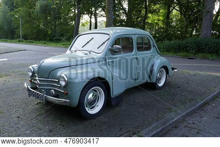 Amersfoort, The Netherlands May 21 2023 A Light Bleu Very Old Renault 4cv  Is Parked. This Type Of C