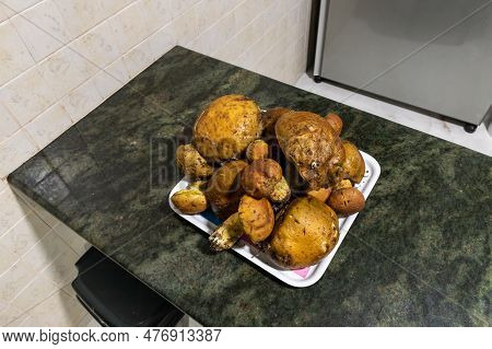 A Bunch Of Freshly Picked Young Edible Mushrooms - Leccinellum Lepidum - Lies On A Tray, On The Kitc