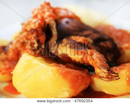 Cuy con Papas - traditionel peruansk mad