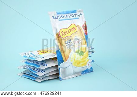 Rollton Instant Mashed Potatoes On A Blue Background. Fast Food, Junk Food.
