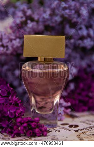 Perfume Among Lilac Flowers,  A Bottle Of Perfume Among The Flowers