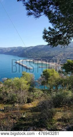 A Stunning View With Sky, Trees And Sea