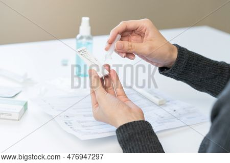 Pandemic Of Disease, Asian Young Woman, Girl Hand Holding Atk, Antigen Kit Self Test. Introducing De