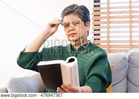 Presbyopia, Hyperopia Mature Asian Woman Holding Eyeglasses Having Problem With Vision Problem Tryin