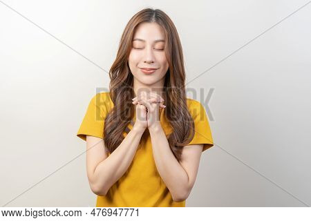 Hopeful Make Wish Or Please, Calm Asian Young Woman Belief, Hand In Prayer. Christian Praying To God