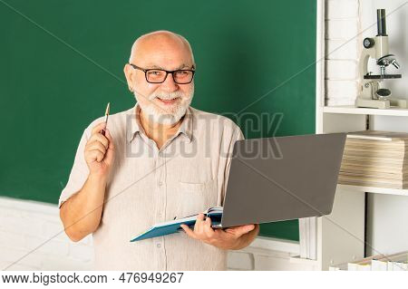 Senior Teacher. Portrait Of Mature Teacher In Classroom. Back To School. Education And Knowledge. Mi