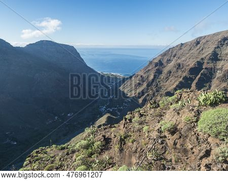 Aerial View From Mirador De La Curva Del Queso. Green Valley Of Valle Gran Rey With Mountain Cliffs,