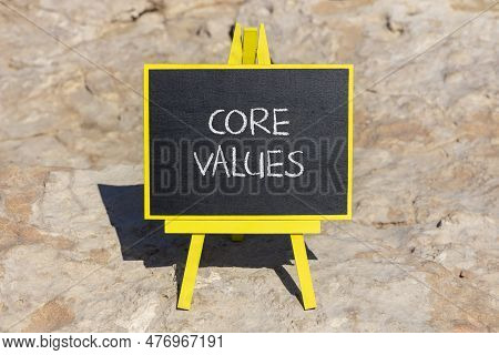 Core Values Symbol. Concept Words Core Values On Black Chalk Blackboard On A Beautiful Stone Backgro
