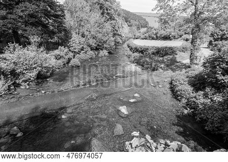 View From Malmsmead Bridge Of Badgeworthy Water And The Doone Valley In Exmoor National Park