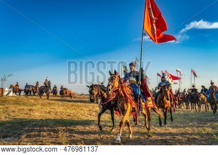 Gniew, Poland, Aug 2020 Polish Hussars Riding On Horses And Carrying Emblems And Flags, Heavy Cavalr