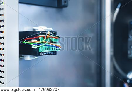 Electrical Equipment. Cabinet With Electrical Appliances Close-up. Numbered Power Equipment With Wir