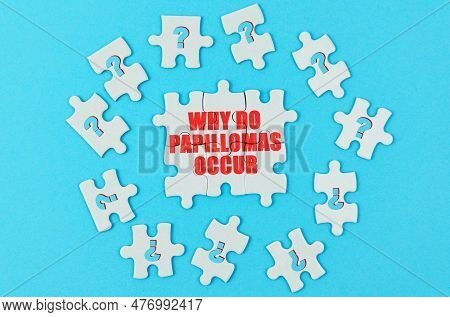 Medical Concept. On A Blue Surface Are Puzzles With A Question Mark, In The Center With The Inscript