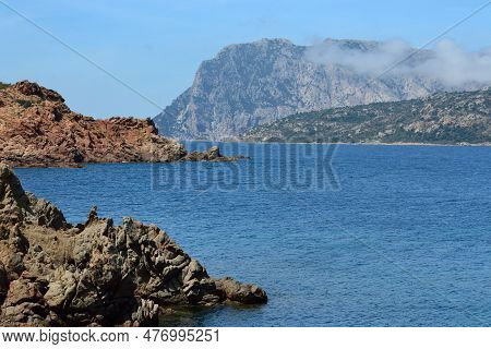 The Coast Of Capo Coda Di Cavallo, In Background The Island Of Tavolara
