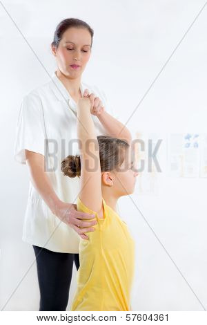Femile Chiropractor doing adjustment on female patient
