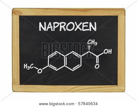 chemical formula of naproxen on a blackboard