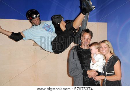 Tony Hawk with Lhotse Merriam and their daughter Kadence at the Unveiling of Madame Tussauds Wax Figure of Tony Hawk. Madame Tussauds Wax Museum, Hollywood, CA. 07-29-09