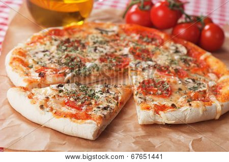 Italian funghi pizza, classic recipe with mushrooms, cheese and tomato