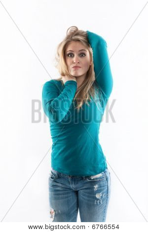 Girl in jeans with the â€œwho meâ€ look.
