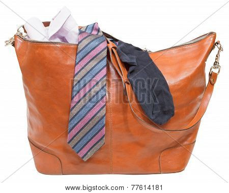 Men's Leather Bag With Shirt, Tie, Sock Isolated