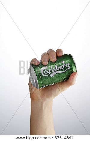 Kuala Lumpur,Malaysia 9th April 2015,hand holding a can of the carlsberg beer drink