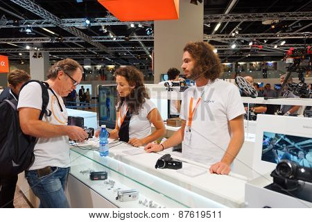 COLOGNE, GERMANY - SEPTEMBER 19, 2014: Sony stand in Photokina Exhibition interior. The Photokina is the world's largest trade fair for the photographic and imaging industries