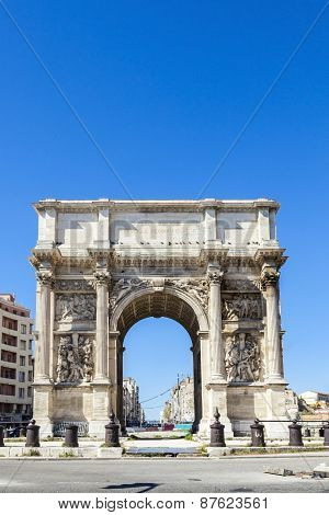 MARSEILLES, FRANCE - JUNE 5, 2016: Triumphal arc Porte also known as Porte Royale by Architect Michel-Robert Penchaud in Marseille France ca 1839