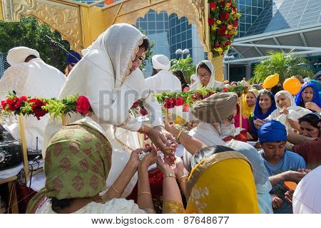 Devotee Sikhs Receiving Prashad