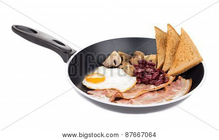 Fried egg with bacon in a frying pan.