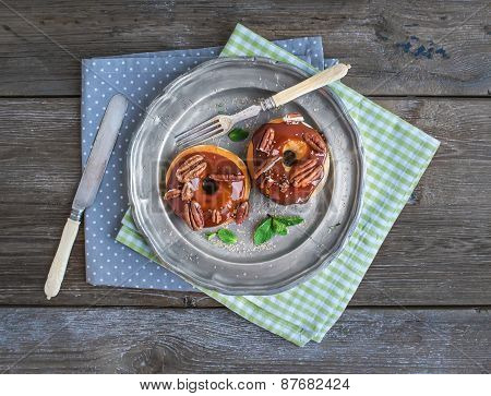Cinnamon Donuts With Caramel Icing And Pekans Served With Fresh
