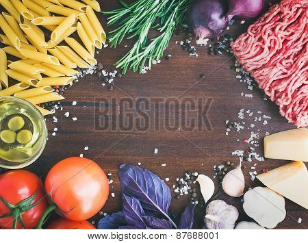 Pasta Bolognese Ingredients: Penne, Minced Meat, Tomatoes, Basil, Rosemary, Parmesan Cheese, Olive O
