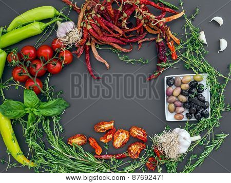 Set Of Mediterranean Vegetables On A Dark Background With A Pace For Unscription In The Center