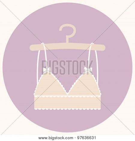 Fashion bra in nude color on the hanger.